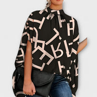 Lurdes- Blusa versátil