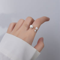 BrilhoNova Anel Triangular Ajustável Pérolas - Elegância