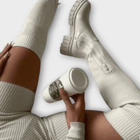 Judita-Botas acima do joelho