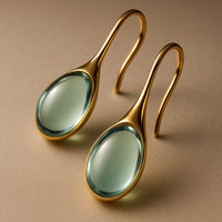 CristalLux Brincos Gota Ouro Prata - Elegância Brilhante